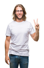 Young handsome man with long hair wearing glasses over isolated background showing and pointing up with fingers number two while smiling confident and happy.