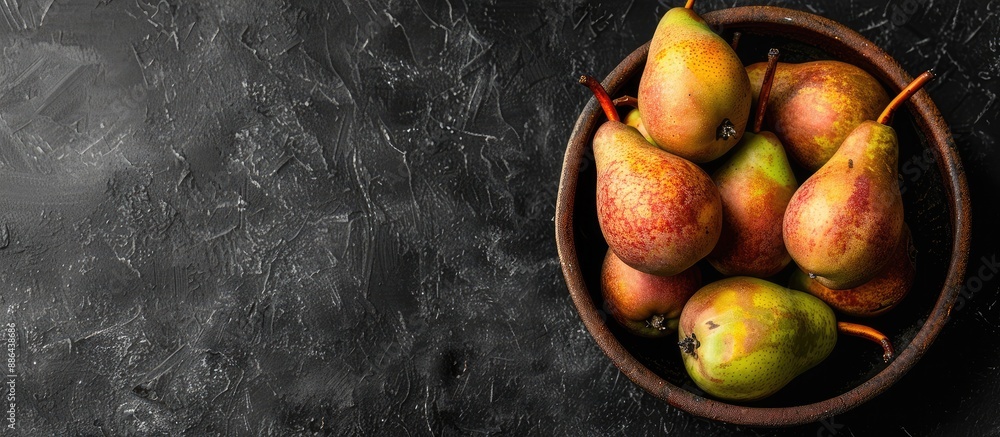 Poster Summer themed concept featuring vibrant ripe pears displayed in a rustic brown bowl with plenty of copy space for text or images