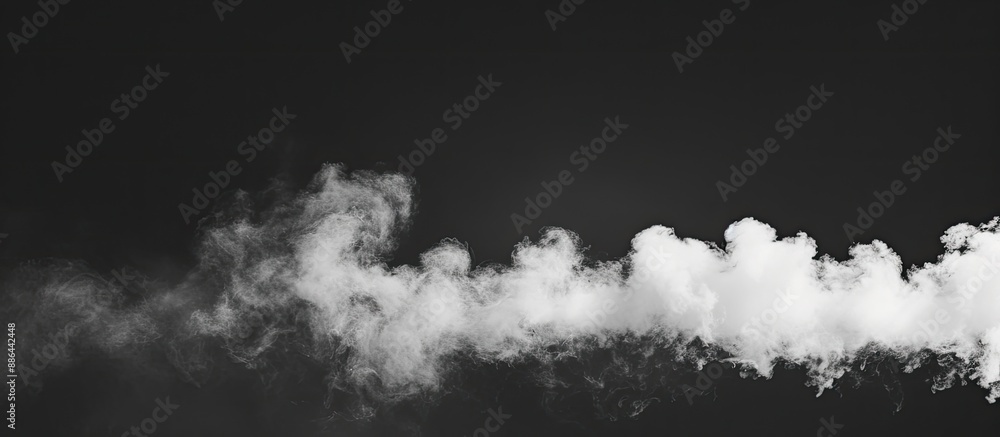 Aufkleber sparse black backdrop contrasted by billowing white steam creates an impactful copy space image