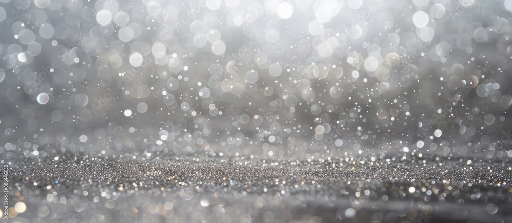 Poster silver background with a metallic sheen and scattered light spots perfect for projects requiring cop