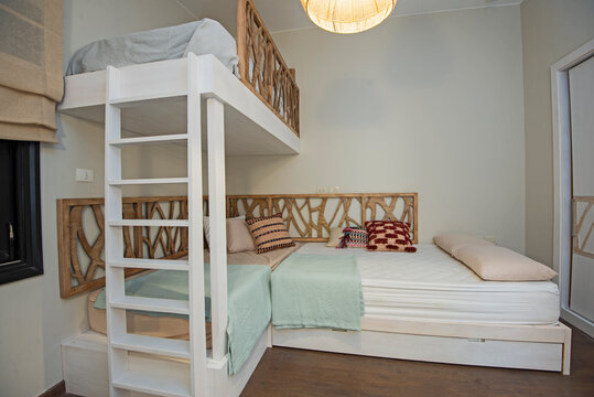 Interior design of bedroom in house with bunk beds