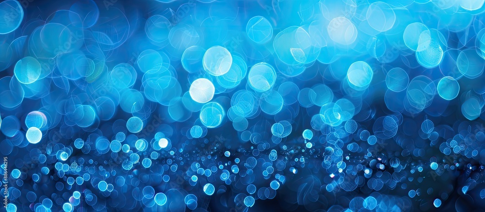Fototapete Blue abstract background with bokeh effect suitable for copy space image
