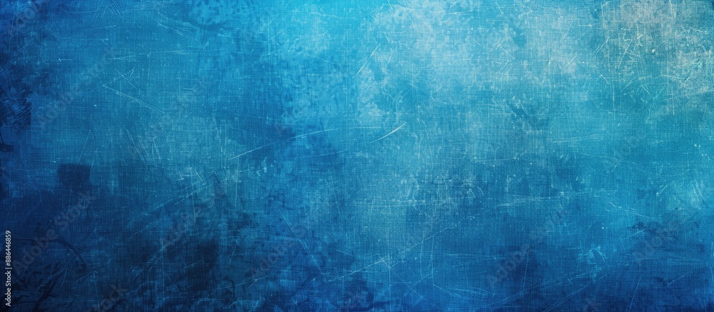 Poster Grunge background with a blue canvas texture providing copy space image