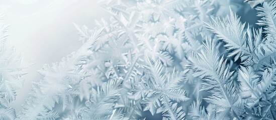 Copy space image of frost patterns on a frozen window symbolizing the wonder of the Christmas season ideal for holiday backgrounds