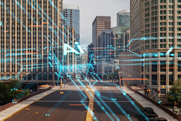 Urban cityscape with a double exposure of futuristic holographic technology overlay. Photography with a concept of future, technology, and business in a downtown setting. Double exposure