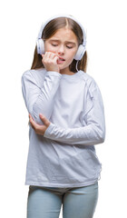 Young beautiful girl wearing headphones listening to music over isolated background looking stressed and nervous with hands on mouth biting nails. Anxiety problem.