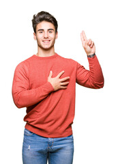 Young handsome man over isolated background Swearing with hand on chest and fingers, making a...