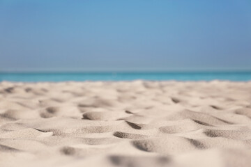 Beautiful sandy beach and sea on sunny day. Summer vacation