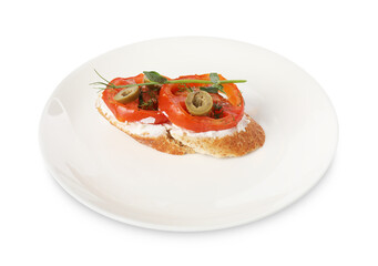 Delicious ricotta bruschetta with sliced tomatoes, olives and greens isolated on white