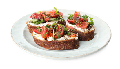 Delicious bruschettas with ricotta cheese, tomatoes and arugula isolated on white
