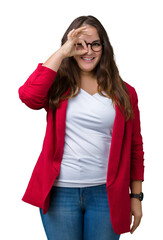 Beautiful plus size young business woman wearing elegant jacket and glasses over isolated background doing ok gesture with hand smiling, eye looking through fingers with happy face.