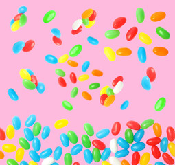 Many sweet jelly candies falling on pink background