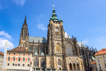 Obraz premium The Metropolitan Cathedral of Saints Vitus, Wenceslaus and Adalbert, a Catholic metropolitan cathedral in Prague, commonly named only as St. Vitus Cathedral is sited in Prague Castle