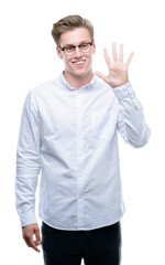 Young handsome blond man showing and pointing up with fingers number five while smiling confident and happy.