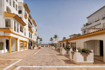 In the first, a fragment of the town of Puerto Banus, Malaga, Spain, a small charming town in Andalusia, Spain