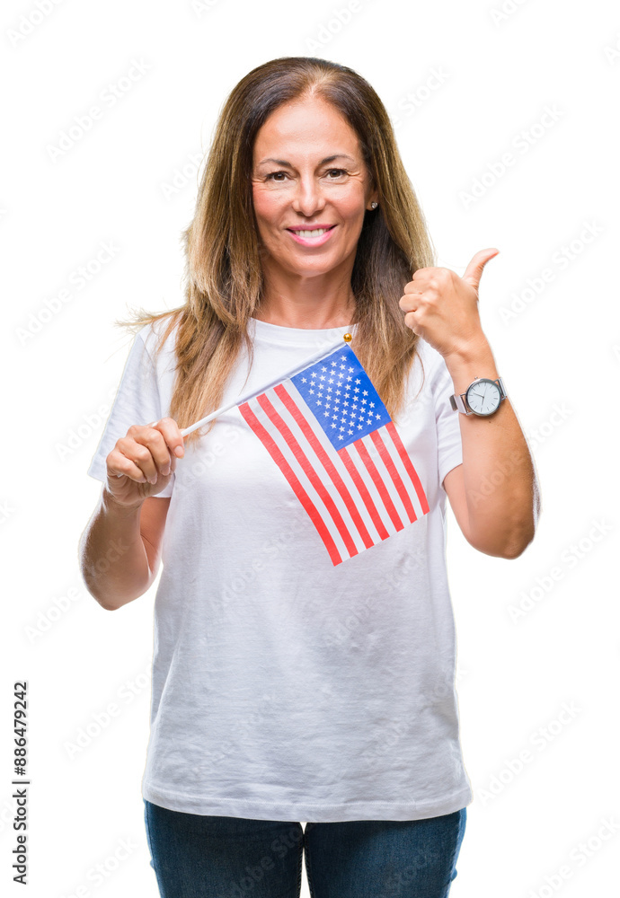 Canvas Prints Middle age hispanic woman holding flag of United States of America over isolated background happy with big smile doing ok sign, thumb up with fingers, excellent sign