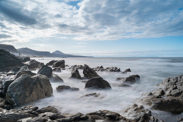 Fototapeta premium Long exposure seascape in the coast of Arucas. Gran Canaria. Canary islands. spain