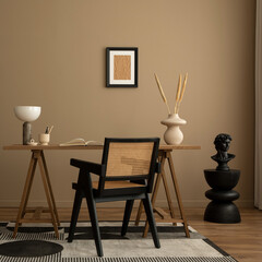 Elegant composition of workplace interior with mock up poster frame, wooden desk, rattan chair,...