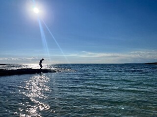 silhouette of a surfer
