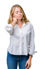 Beautiful young business woman over isolated background Suffering of neck ache injury, touching neck with hand, muscular pain