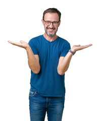 Handsome middle age hoary senior man wearin glasses over isolated background Smiling showing both hands open palms, presenting and advertising comparison and balance