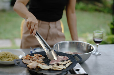 person preparing food in the kitchen