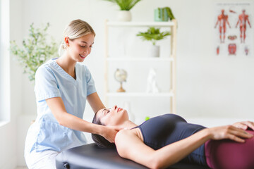 physiotherapist and client treatment for rehabilitation consultation, mobility or injury.