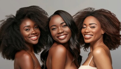 Three beautiful smiling afro women African American models, flawless glamor makeup. multiracial women, three beautiful women with different skin tones, african ethnicity lifestyle friendship group