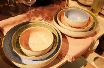 Festive ceramic tableware with Arabic pattern for festive table setting