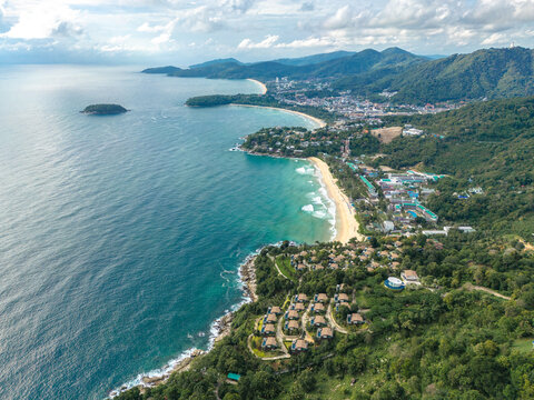 vertical aerial view of the beautiful 3 beaches of Kata, Kata Noi, and Karon Beach viewpoint at Phuket, Thailand.