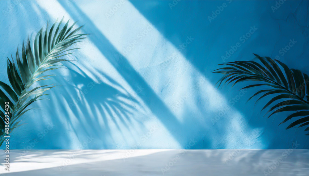 Poster blurred shadow from palm leaves on the light blue wall. minimal abstract background for product pres