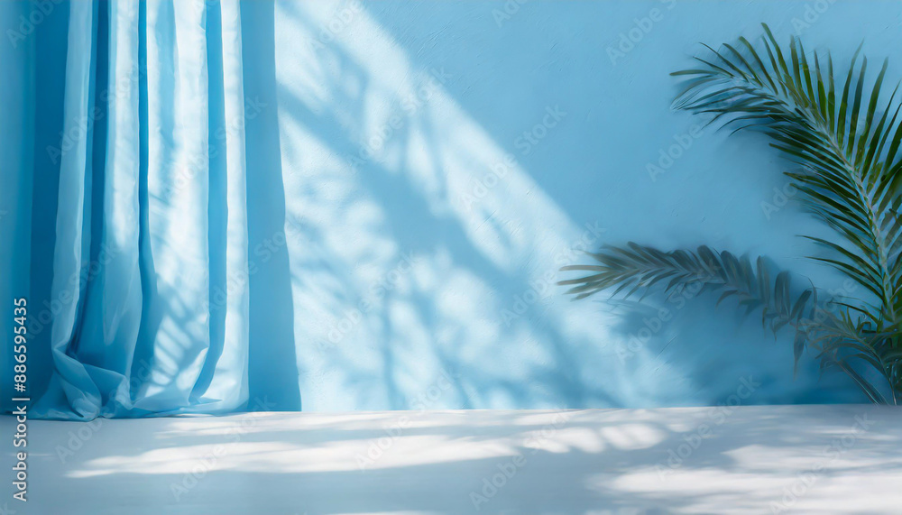 Poster blurred shadow from palm leaves on the light blue wall. minimal abstract background for product pres
