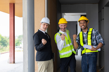 Businessman, contractors and engineers working at construction sites are construction inspector and supervise the work according to plans. Coworker cooperation and teamwork to ensure workplace safety.