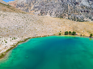 The aerial views of Green Lake, a crater lake, is on the Gömbe Plateau, famous for its unique geographical riches.