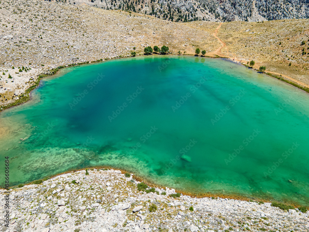 Wall mural The aerial views of Green Lake, a crater lake, is on the Gömbe Plateau, famous for its unique geographical riches.