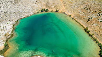 The aerial views of Green Lake, a crater lake, is on the Gömbe Plateau, famous for its unique geographical riches.