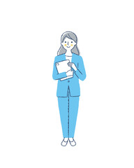 タブレット端末を持って立っているビジネスウーマン