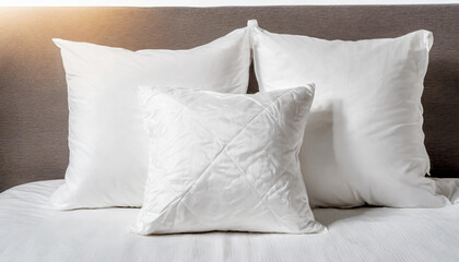 White pillow on bed in bedroom closeup