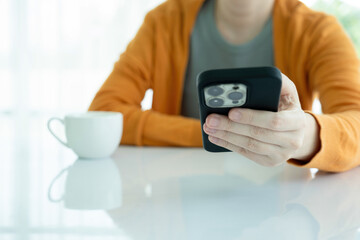 Young woman using smartphone.