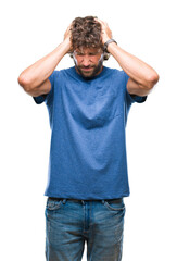 Fototapeta premium Handsome hispanic model man over isolated background suffering from headache desperate and stressed because pain and migraine. Hands on head.