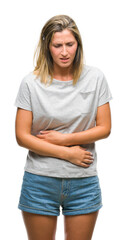 Obraz premium Young beautiful woman over isolated background with hand on stomach because nausea, painful disease feeling unwell. Ache concept.