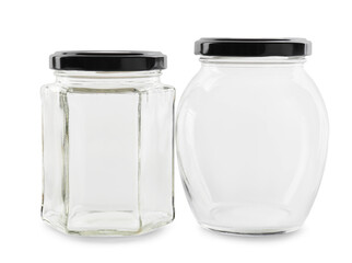 Two empty glass jars isolated on white
