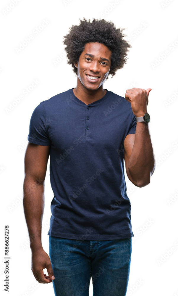 Canvas Prints Afro american man over isolated background smiling with happy face looking and pointing to the side with thumb up.