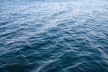 Fototapeta premium Beautiful sea water texture. Top view of ocean waves