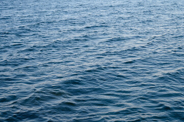 Bright sea water surface with ripple pattern