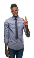 Young african american business man over isolated background showing and pointing up with fingers number three while smiling confident and happy.
