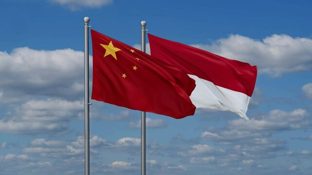 Indonesia and China flags flying together, video concept of the relationship, two country relations concept