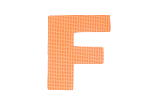 Jigsaw foam plastic orange English uppercase "F" alphabet isolated on cut out PNG or transparent background. Character. Colorful foam alphabet puzzle pieces used in learning education for children.