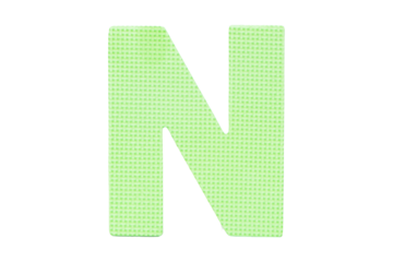 Jigsaw foam plastic green English uppercase "N" alphabet isolated on cut out PNG or transparent background. Character. Colorful foam alphabet puzzle pieces used in learning education for children.