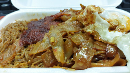 economic bee hoon and kway teow noodle mixed with chili sauce